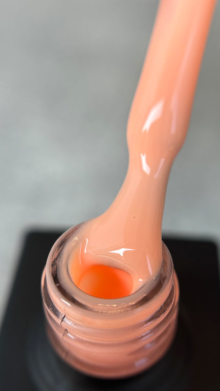 Enhance your manicure with Alisa Nails Germany’s UV Base Color Peach, the perfect foundation for long-lasting and vibrant nail art. This professional-grade base coat not only provides a smooth, even surface for applying color but also strengthens and protects your natural nails. The delicate peach tone adds a subtle, natural warmth to your nails, ideal for a flawless finish or as a base for bold designs. 